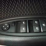 Блок кнопок на двери BMW: стеклоподъёмники, зеркала и блокировка окон