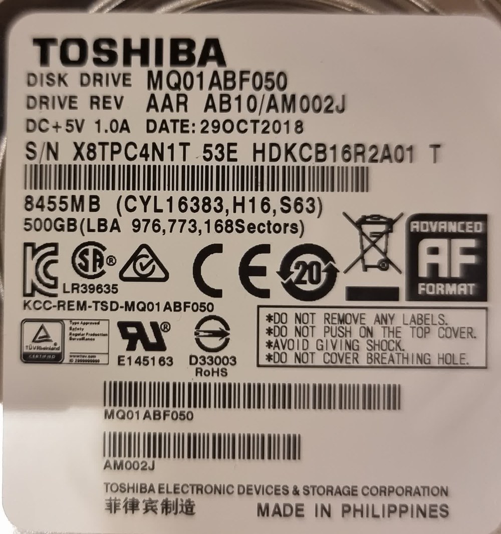 Наклейка жёсткого диска Toshiba MQ01ABF050 со значками и надписями